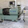 Overig Okuma LC10-25 CNC bewerkingscentrum met spanentransporteur, OSP5000 best. 1