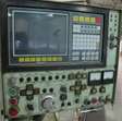 Draaibank Okuma LC20 CNC met spaanafvoerband 5