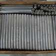 Pallet, ca. 290 kg verzinkte gelagerde rollen t.b.v. rollenbaan. lgt ca 400 mm, diameter 30 mm, asmaat 8 mm